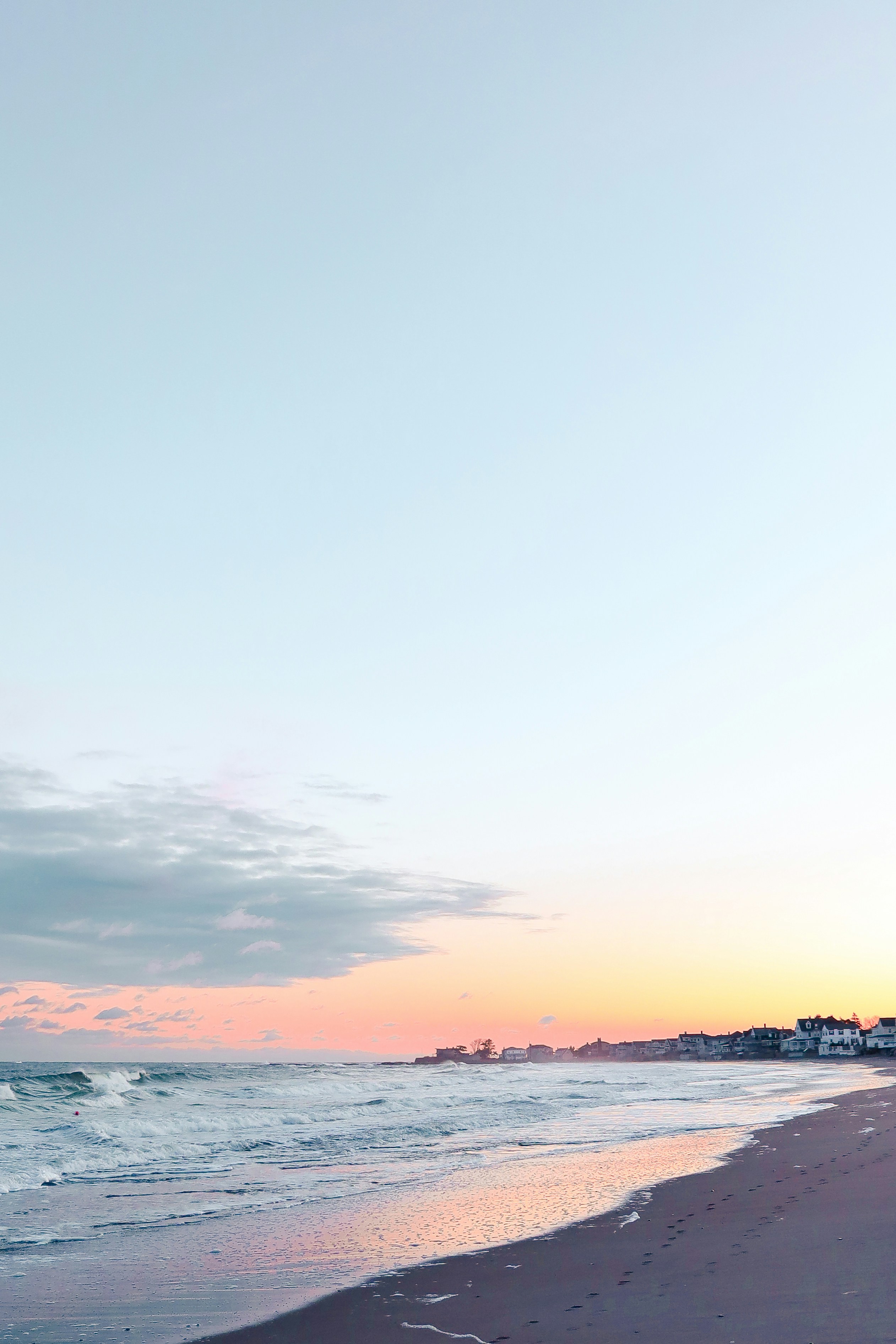 silhouette of people on beach during sunset