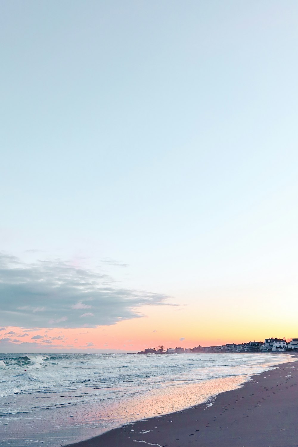 silhouette of people on beach during sunset