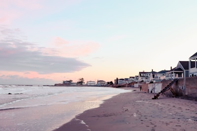 Scenic view of a peaceful beach at sunset, inviting relaxation and exploration.
