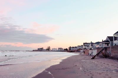 Scenic view of a peaceful beach at sunset, inviting relaxation.