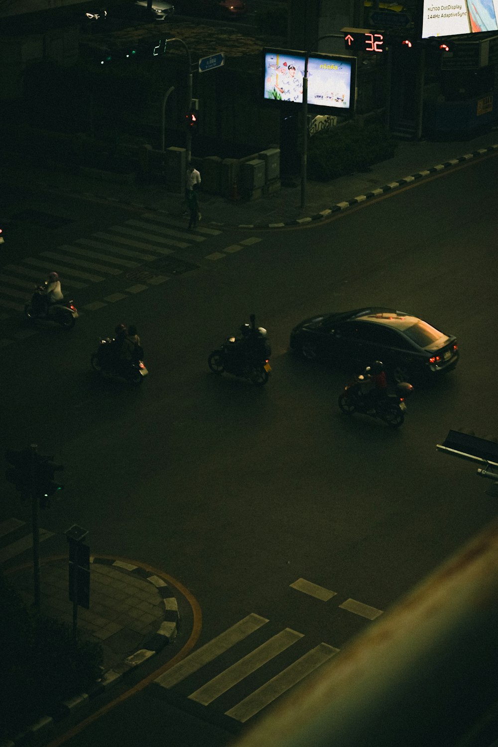 cars parked on parking lot during night time