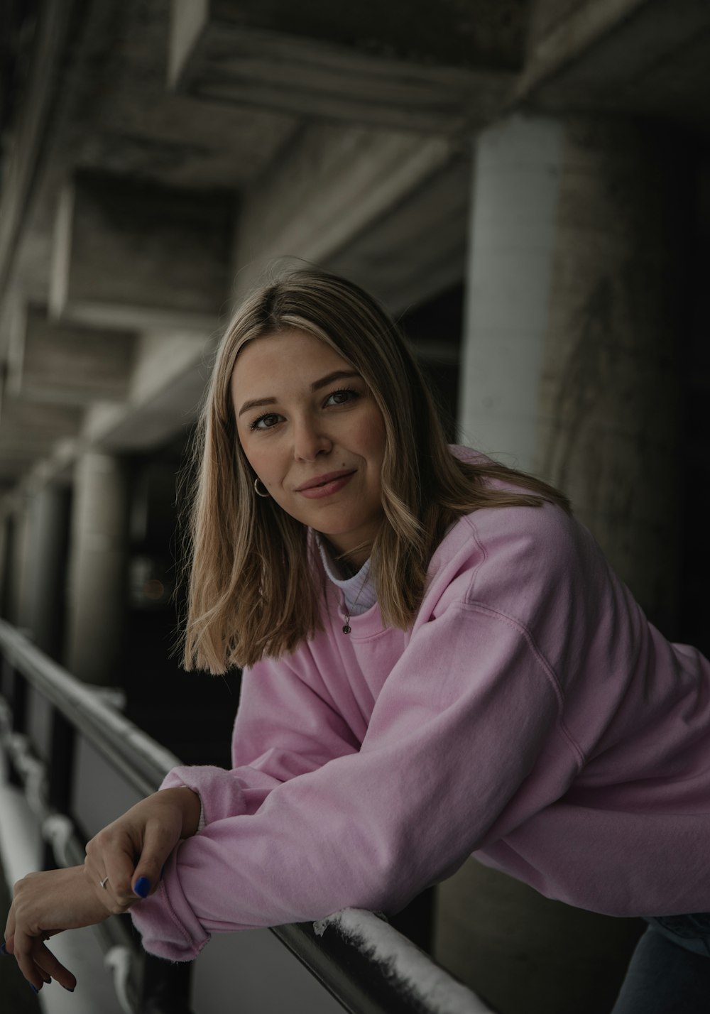 woman in pink long sleeve shirt