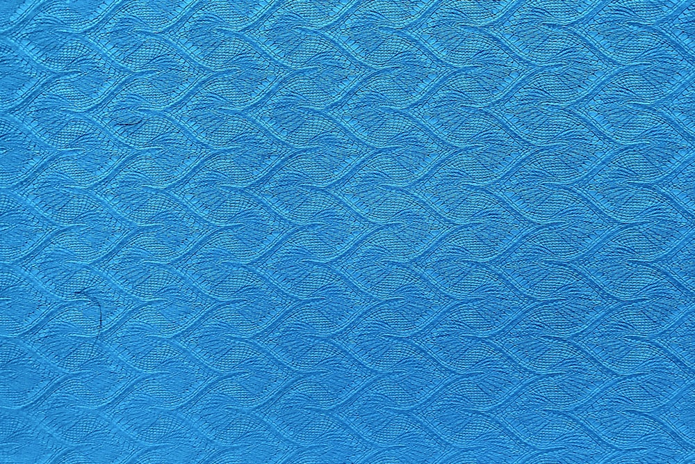 blue textile in close up photography