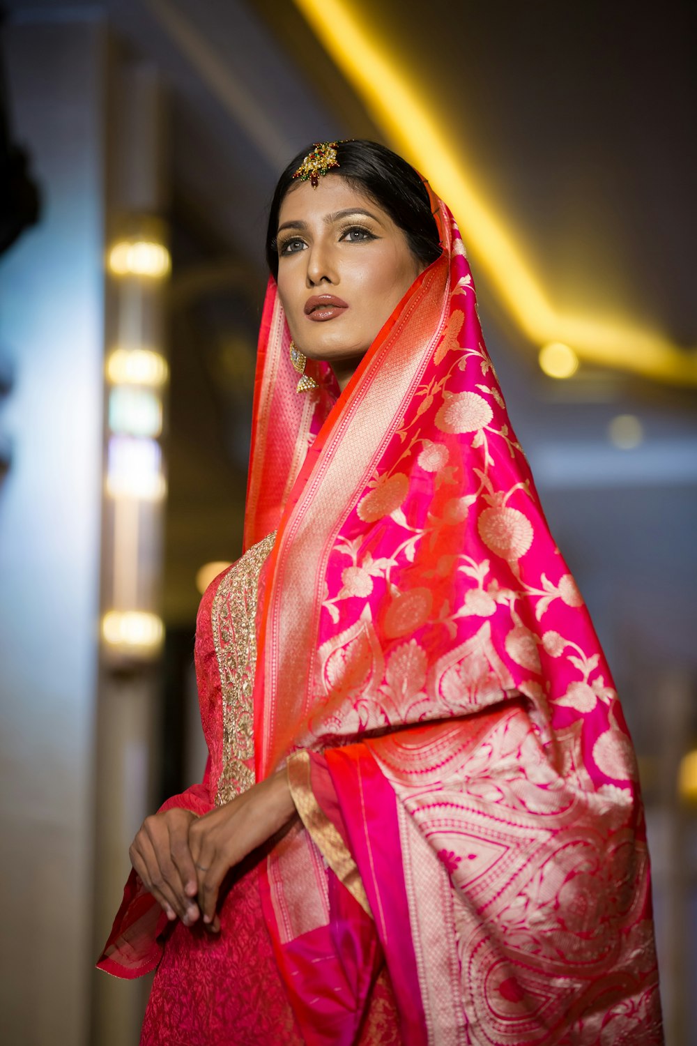 woman in red and white hijab