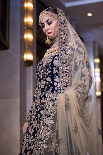 woman in white and blue floral hijab