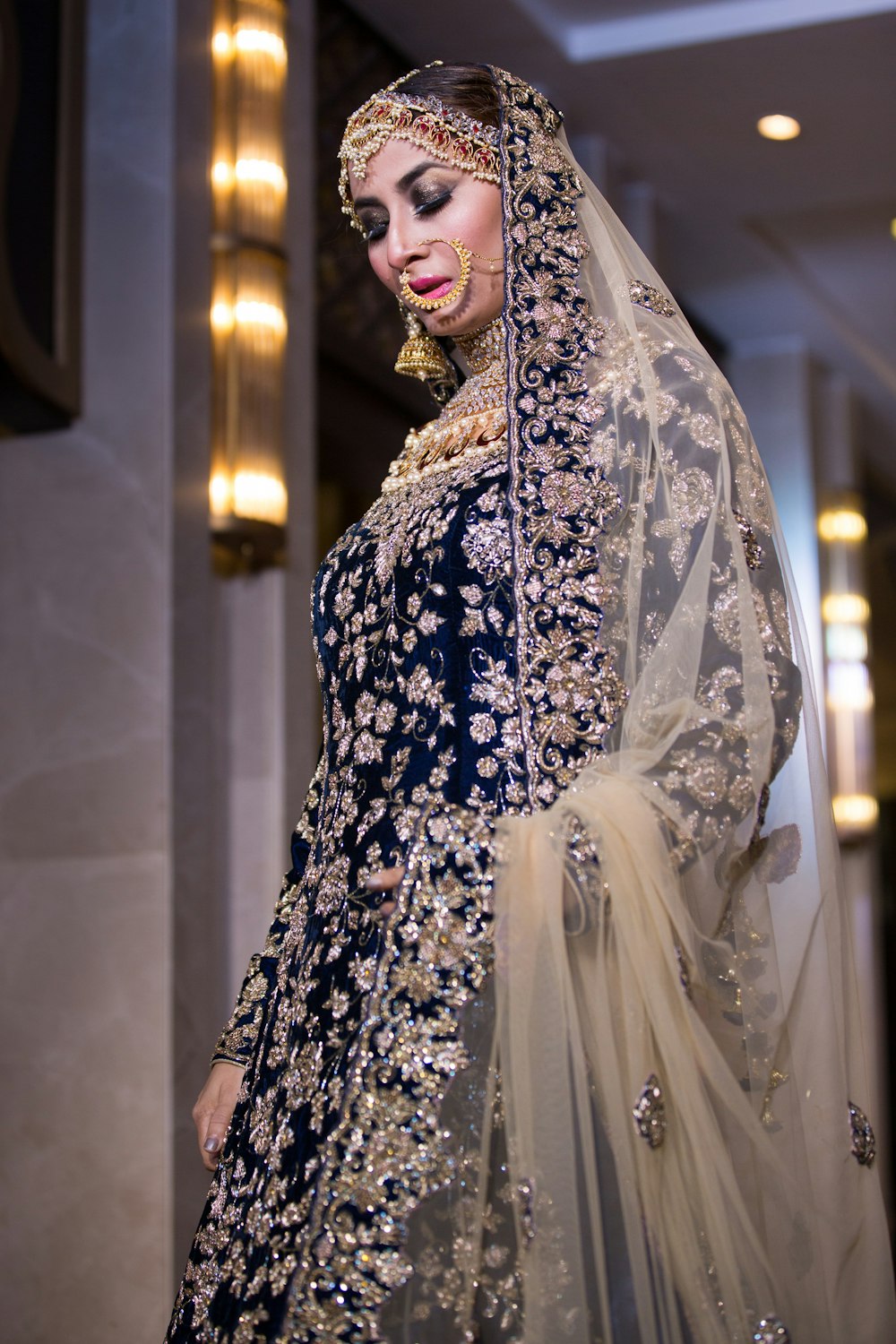 woman in white and blue floral hijab