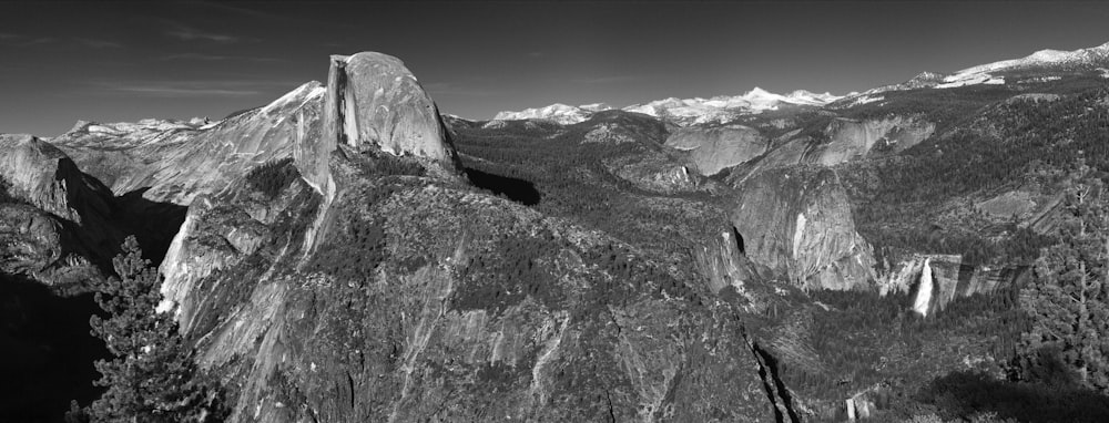 grayscale photo of rocky mountain