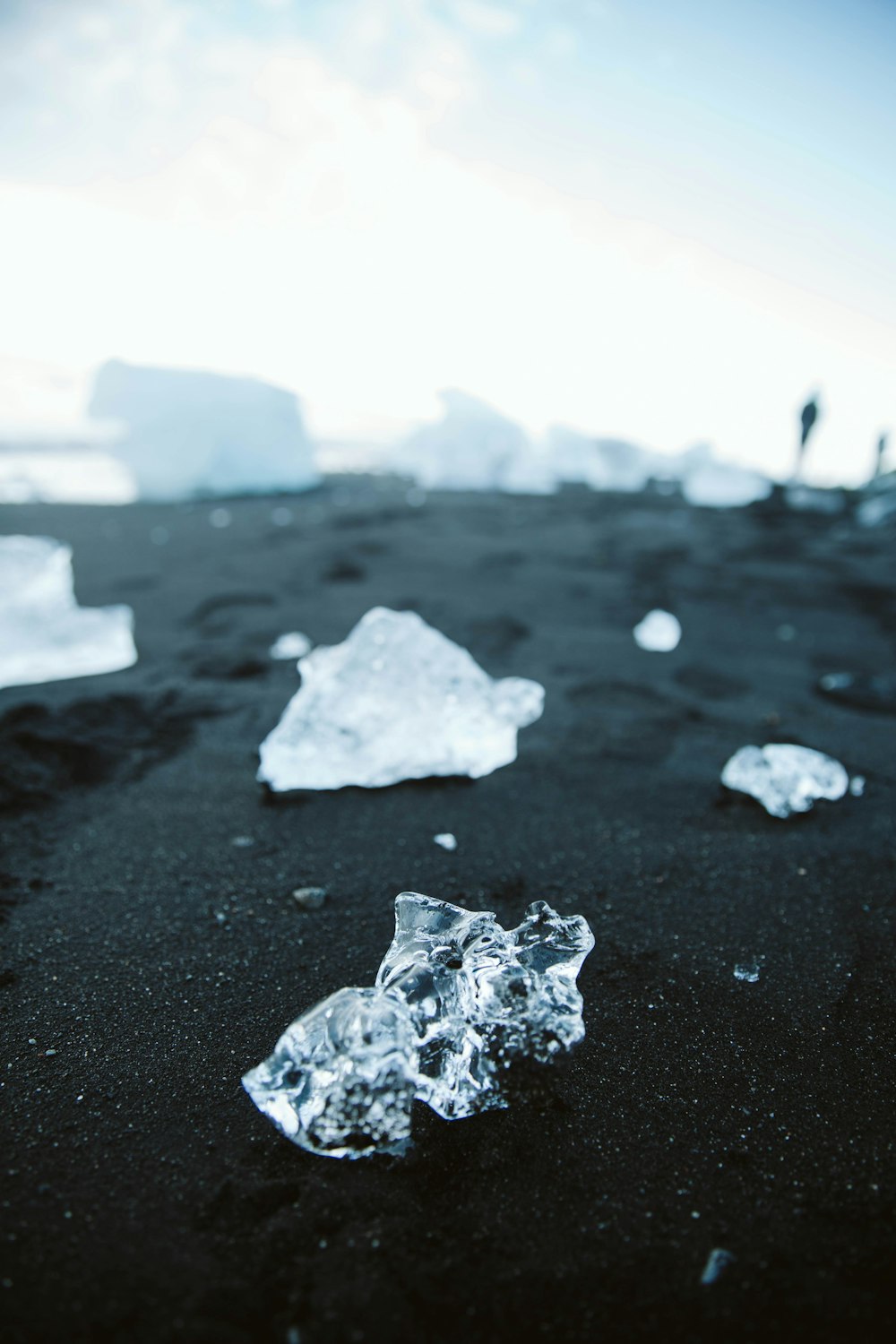 gray and white stone on gray sand during daytime