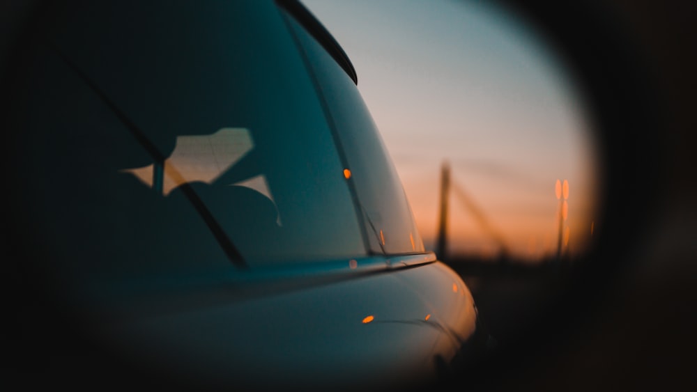 white car on road during daytime