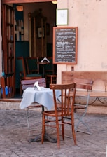 brown wooden chairs and table