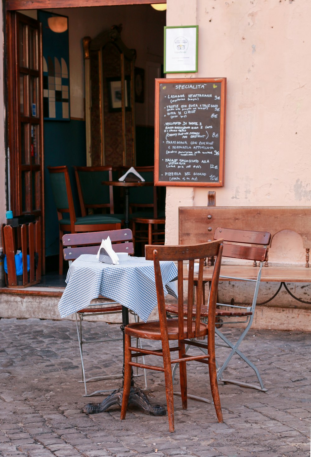 brown wooden chairs and table