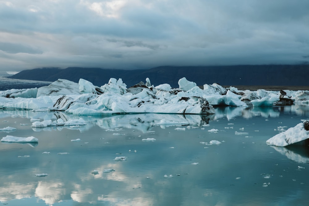 ice on water under cloudy sky