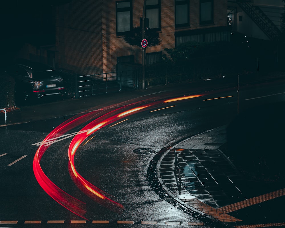 time lapse photography of cars on road during night time