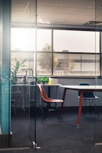 Modern office building with professional meeting room and natural lighting.