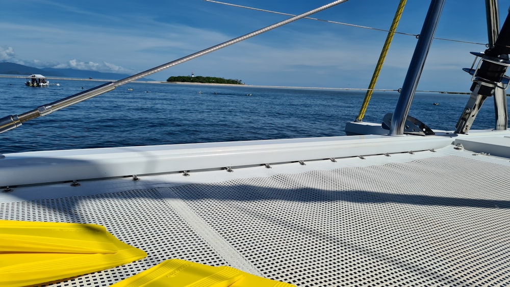 yellow kayak on sea during daytime