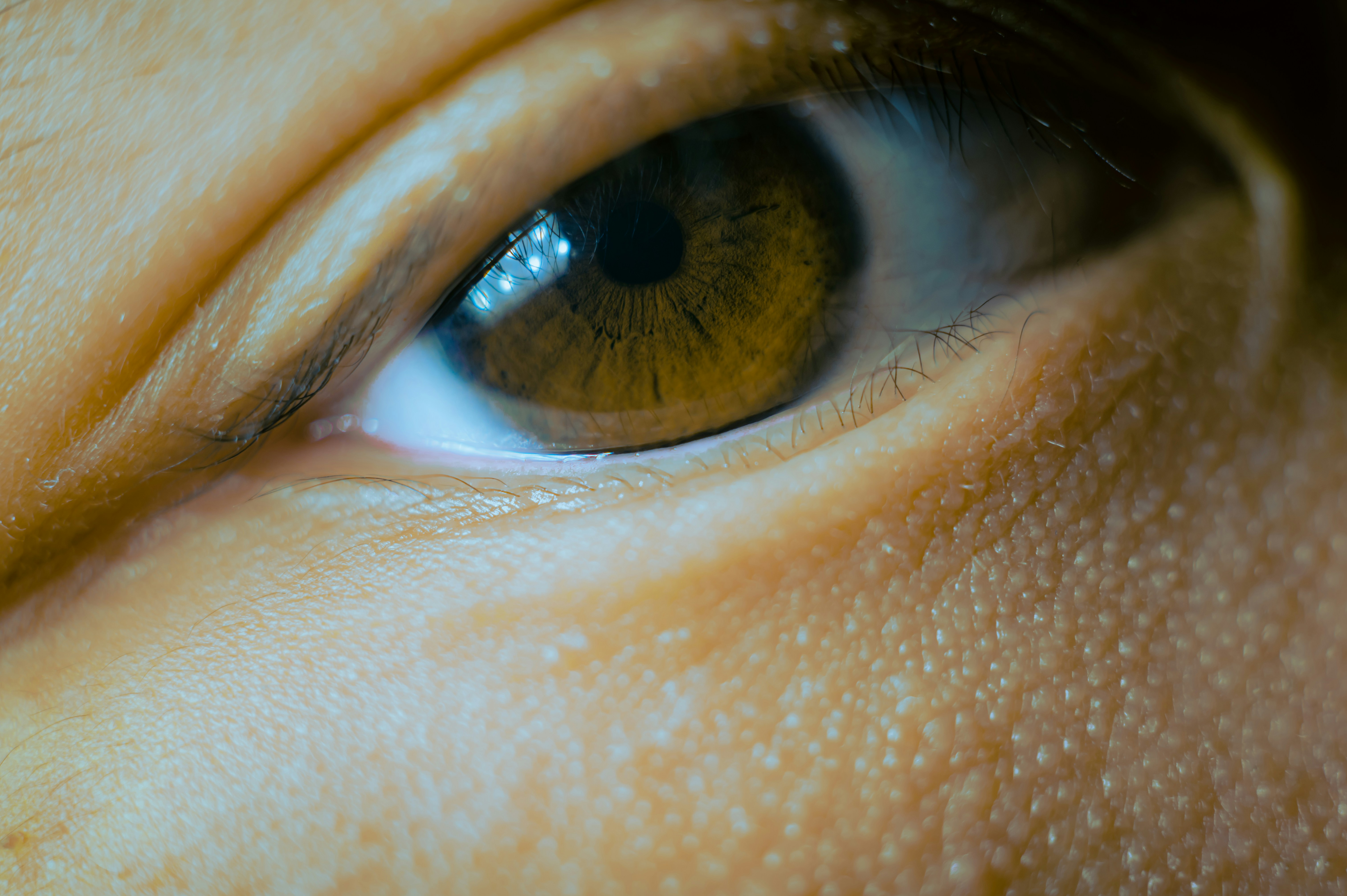 persons eye in close up photography