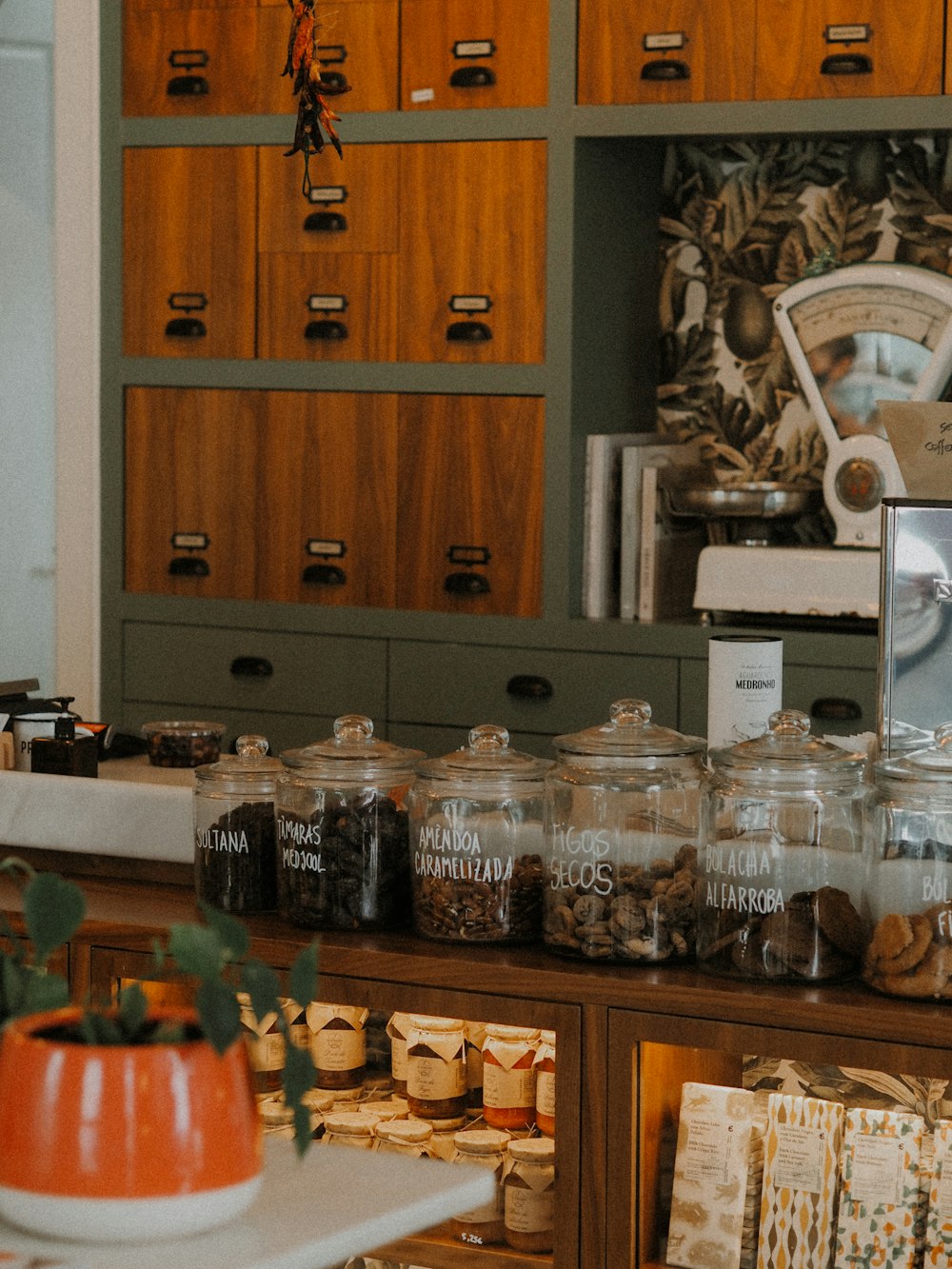 clear glass jars on brown wooden table