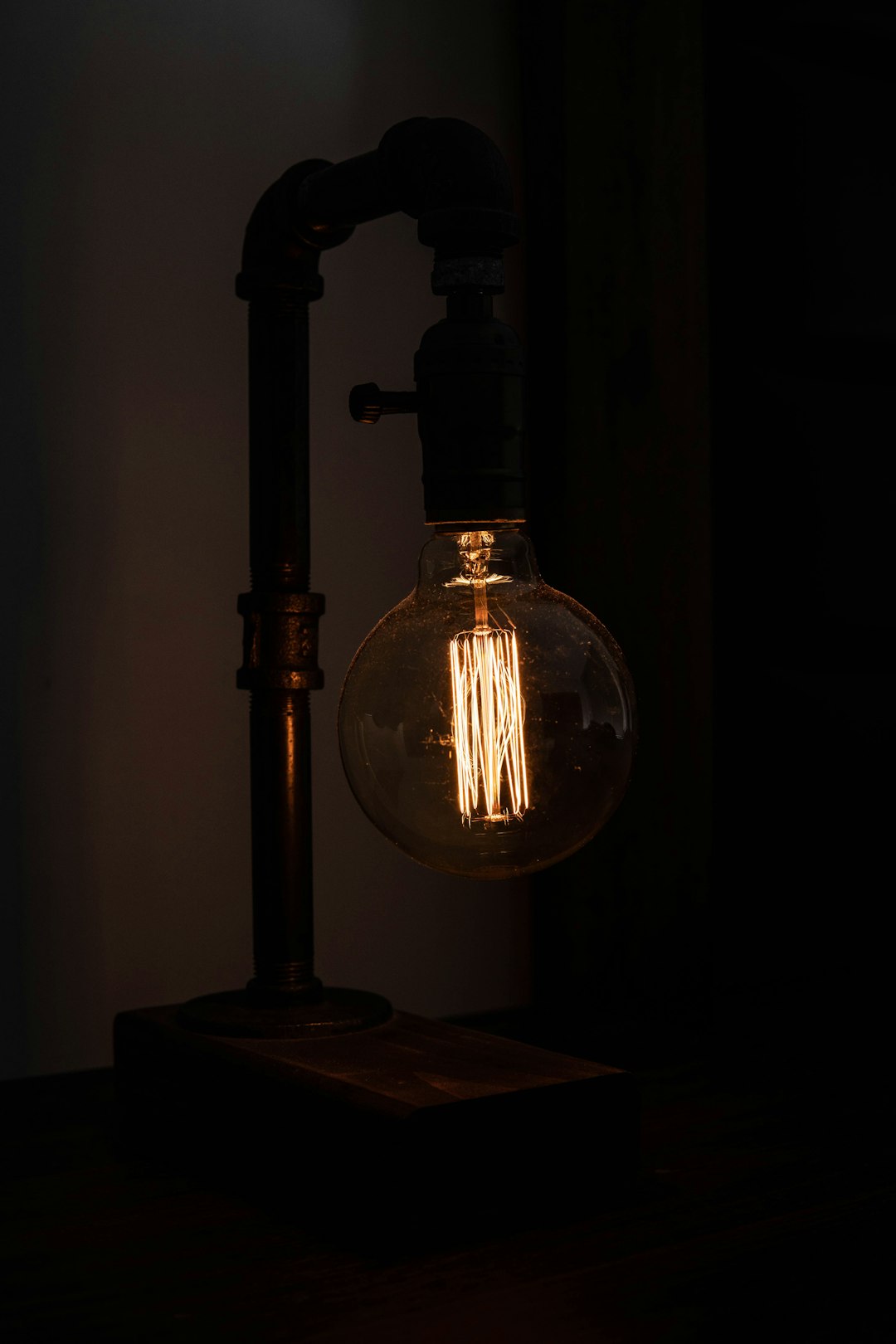 brown wooden table lamp on brown wooden table