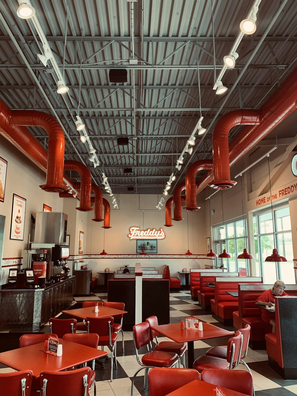 red and black chairs and tables