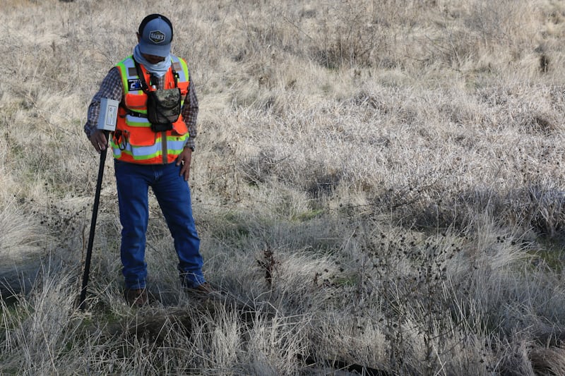 Data collector with GPS equipment on open veld