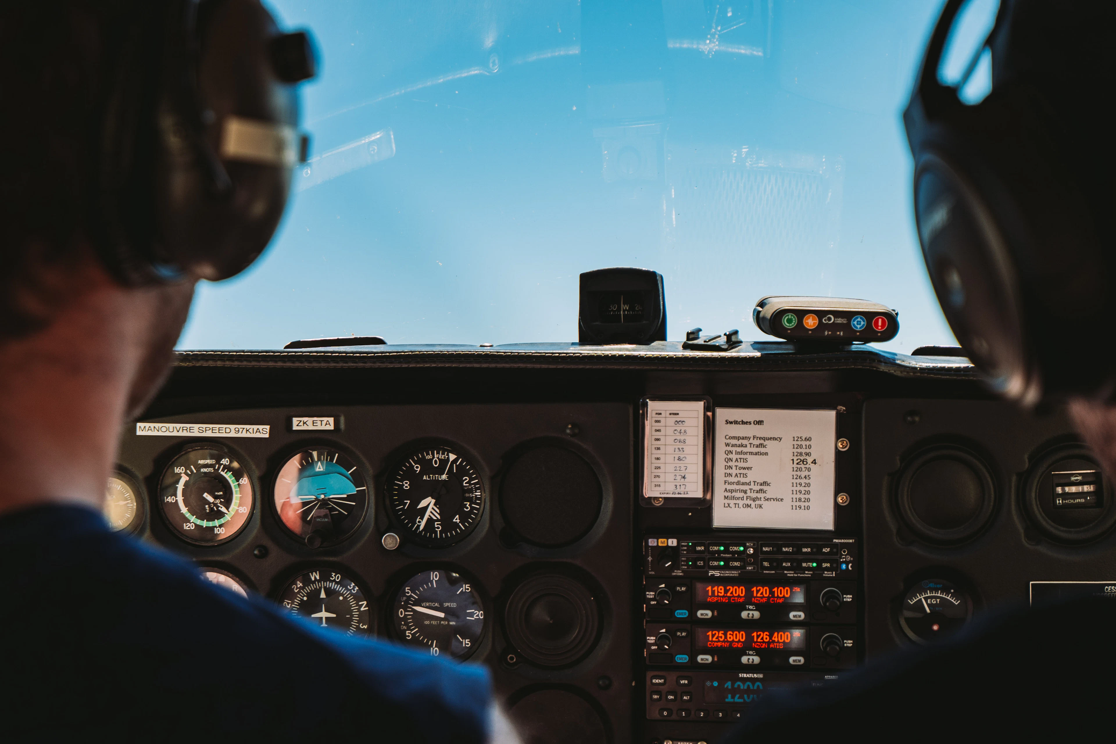 Pilot at the controls of a light aircraft