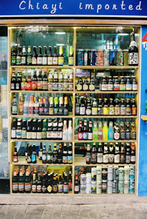 assorted glass bottles on shelf