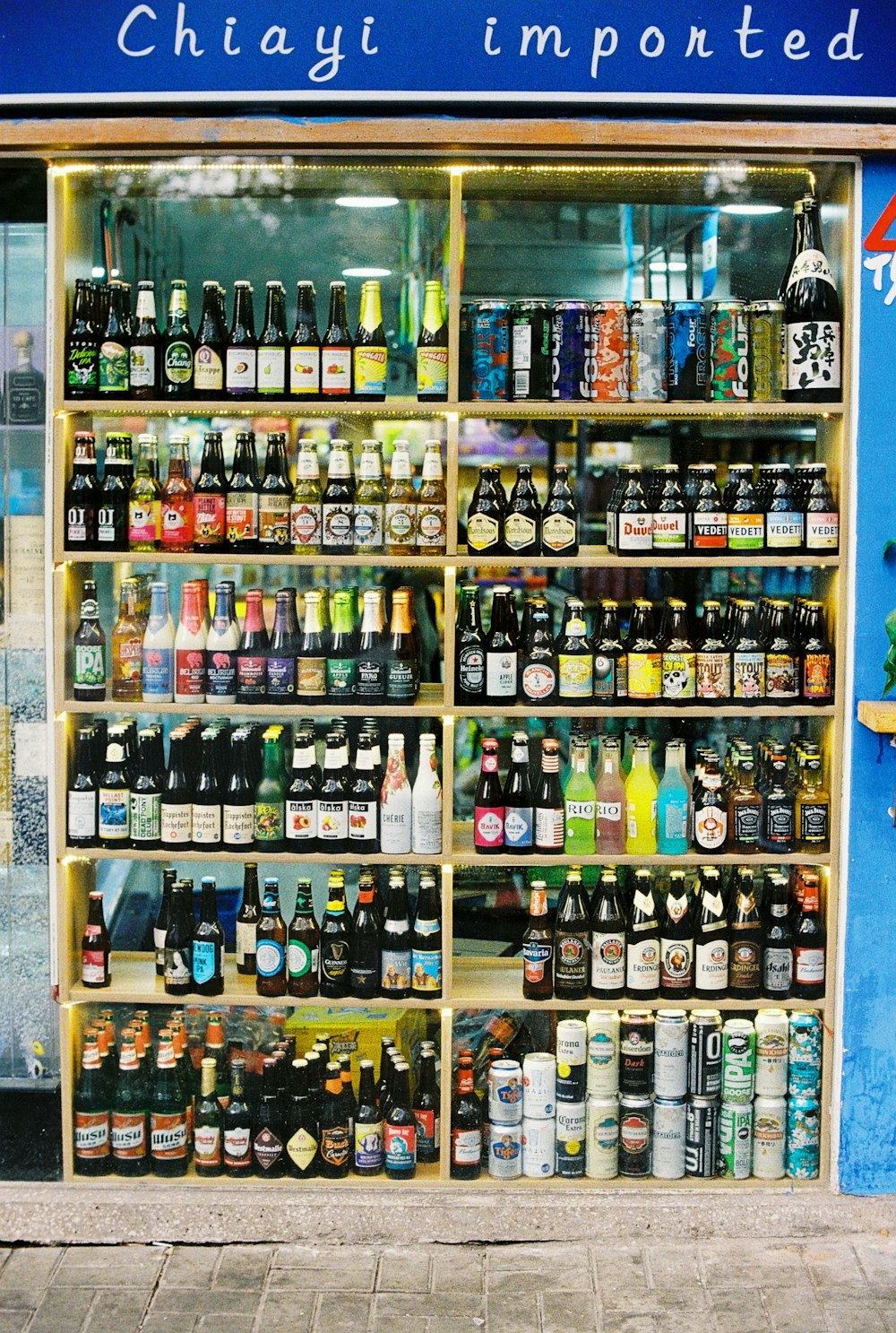 assorted glass bottles on shelf