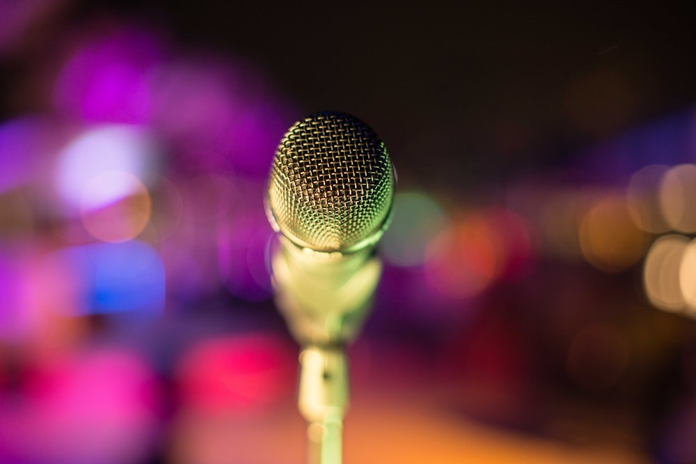 grey microphone with lights in bokeh photography