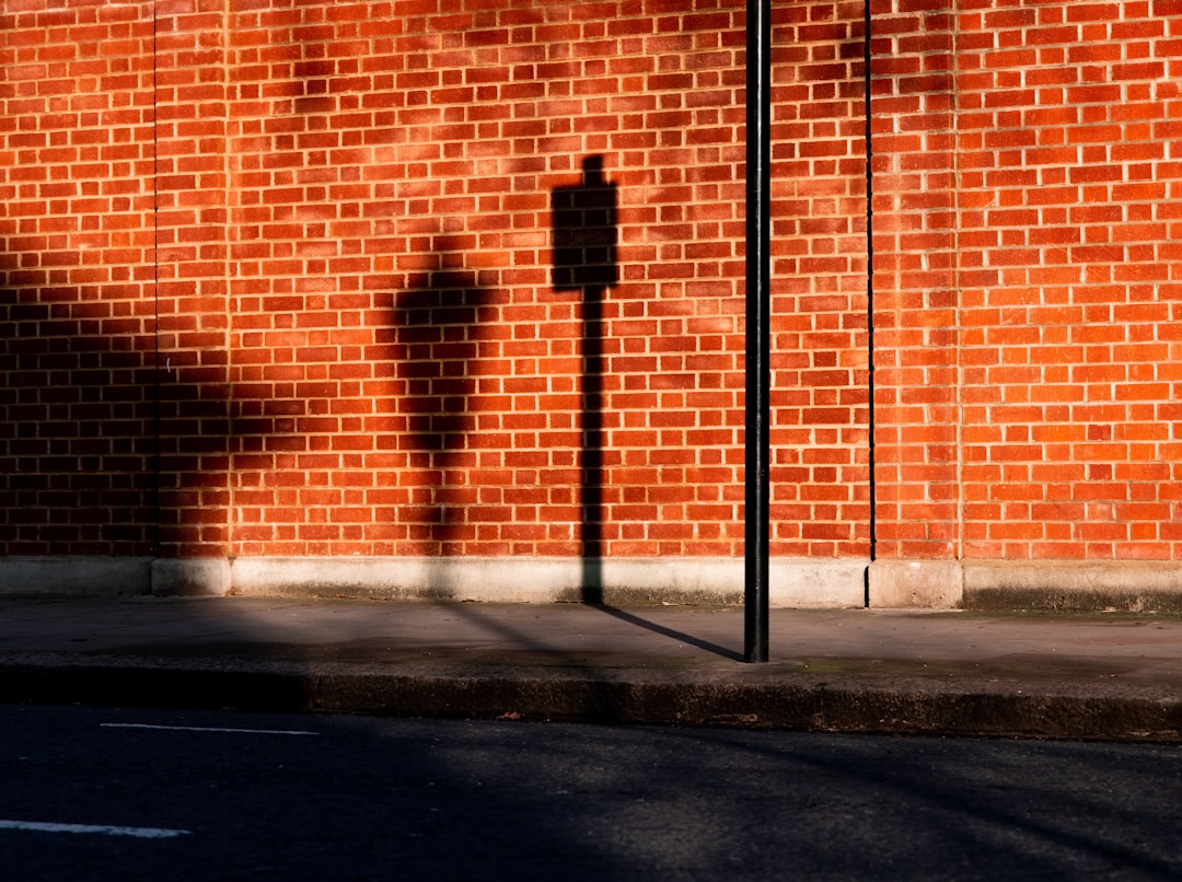 brown brick wall during daytime