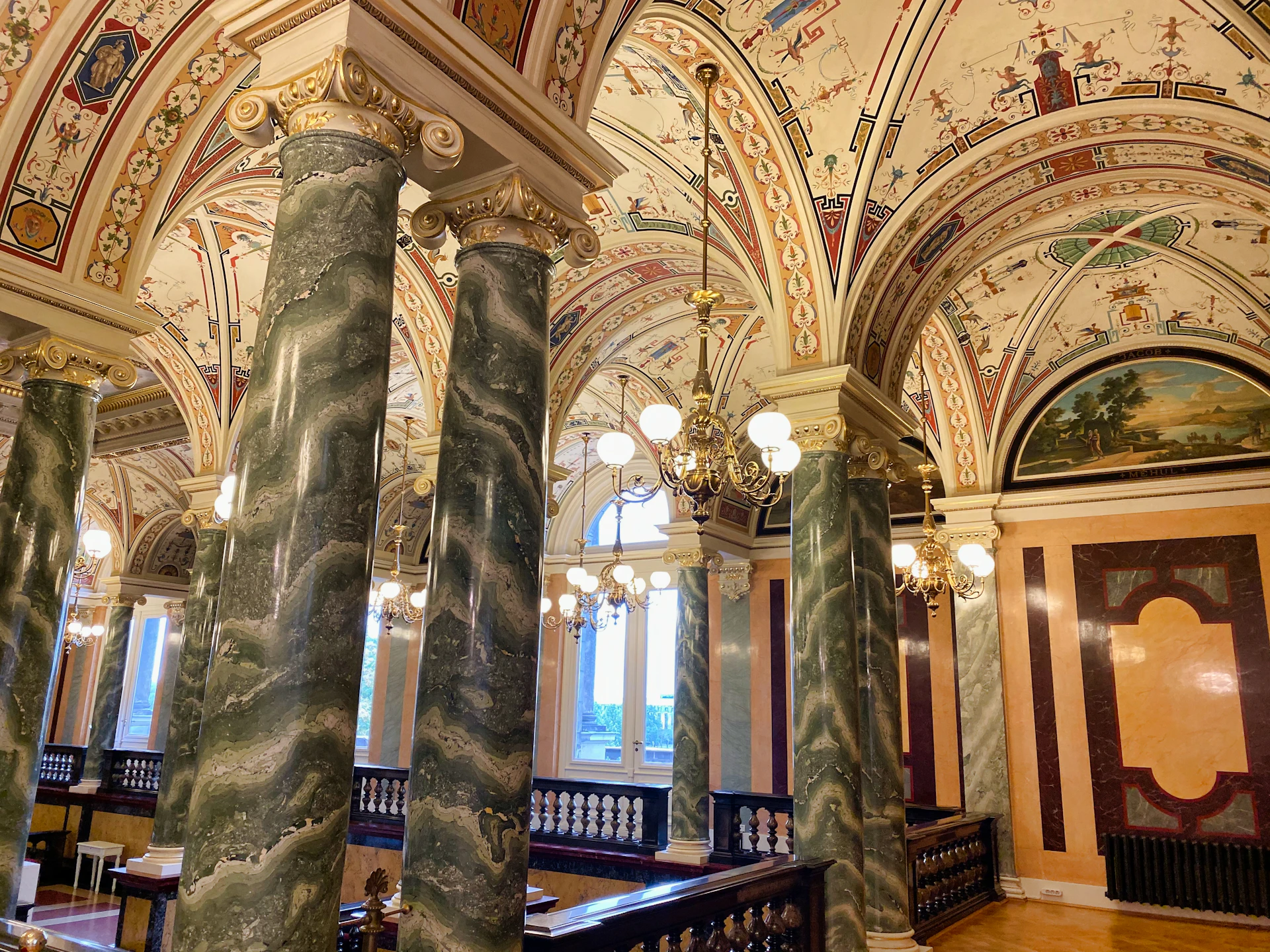woman wearing yellow long-sleeved dress under white clouds and blue sky during daytime