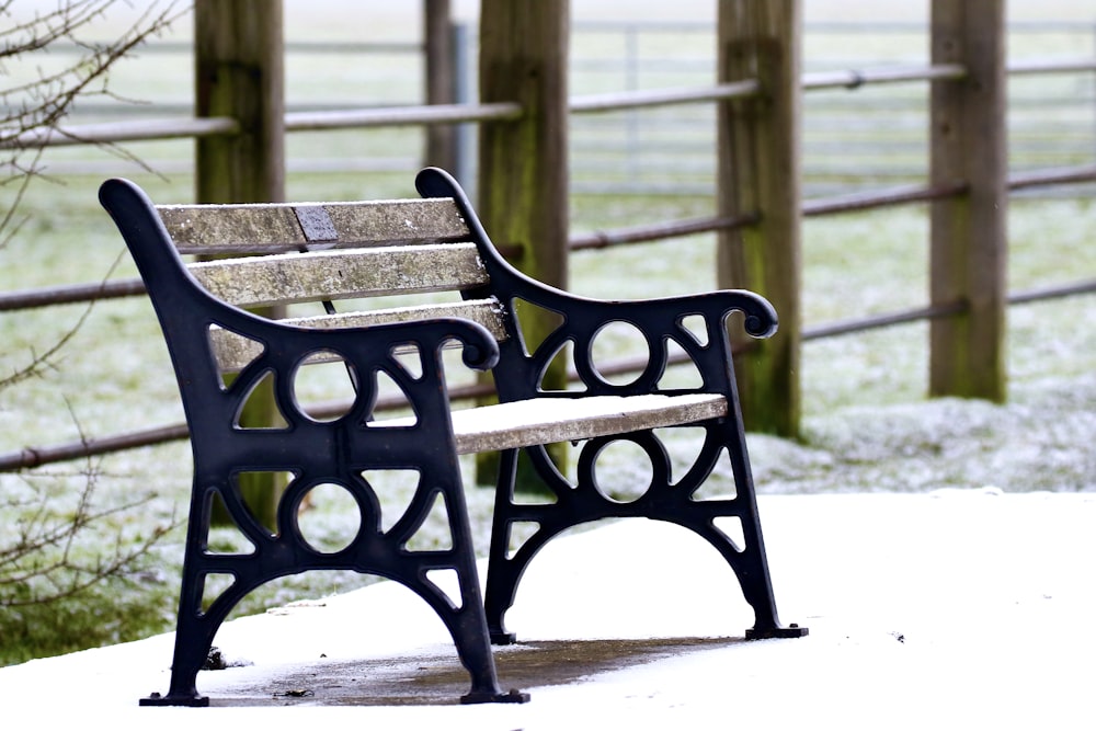 black metal bench on gray concrete floor