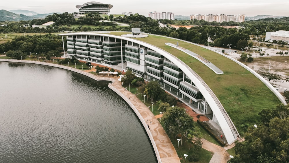 white and black building near river during daytime