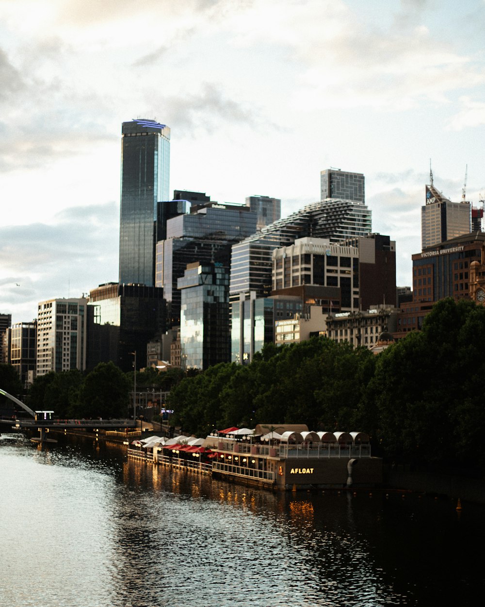 city skyline under white cloudy sky during daytime