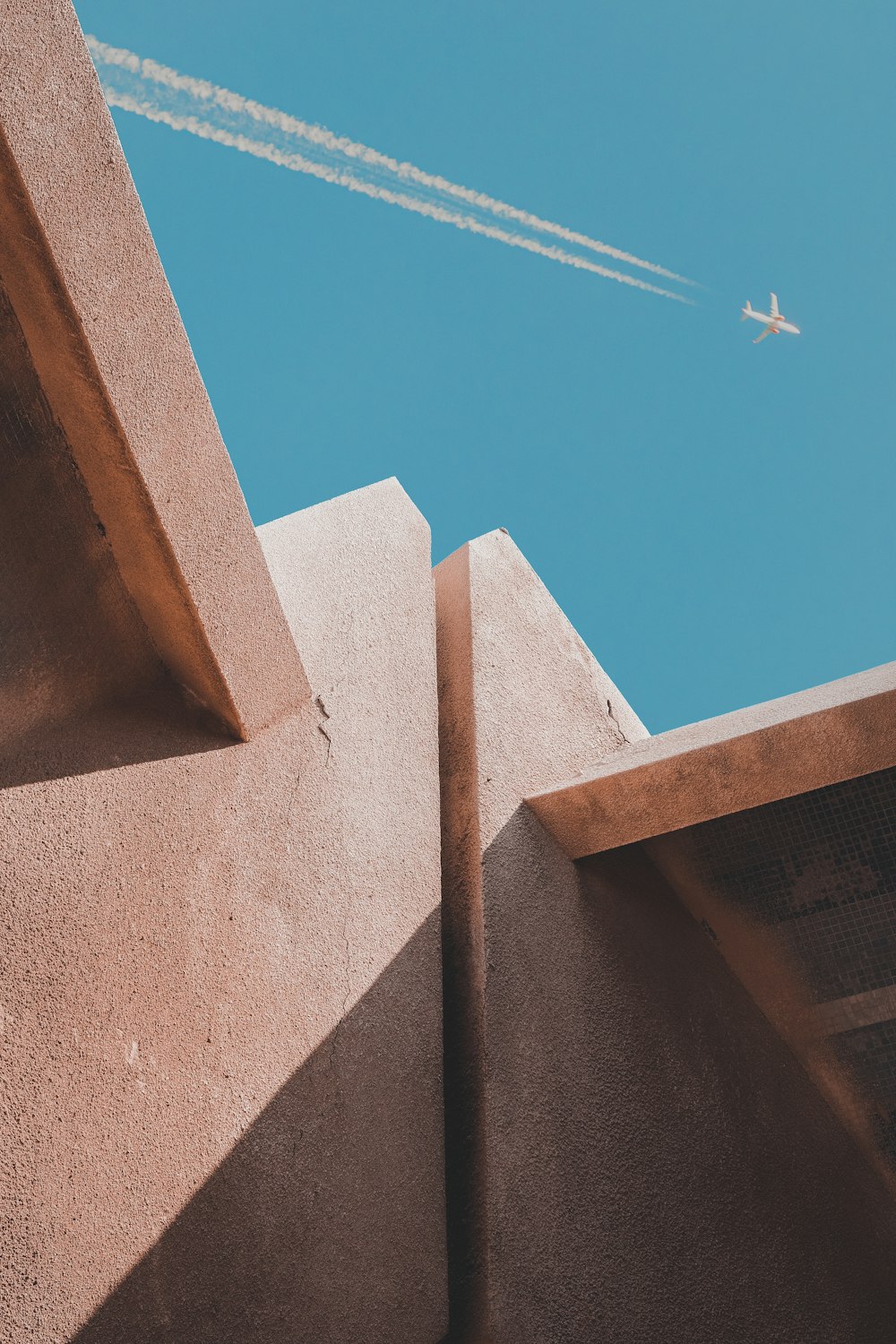 white concrete building under blue sky during daytime