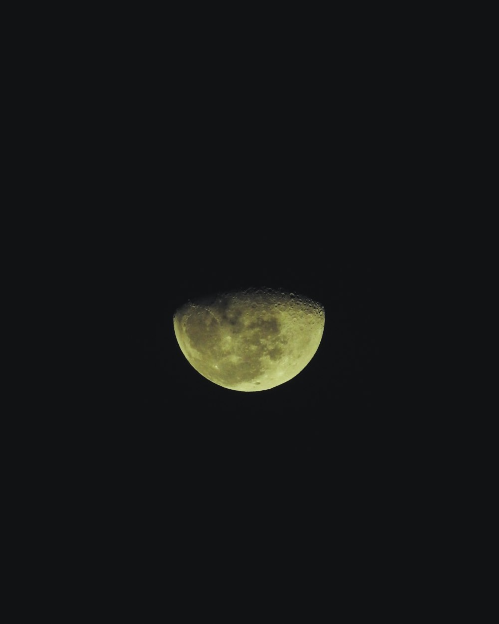 yellow moon in the night sky