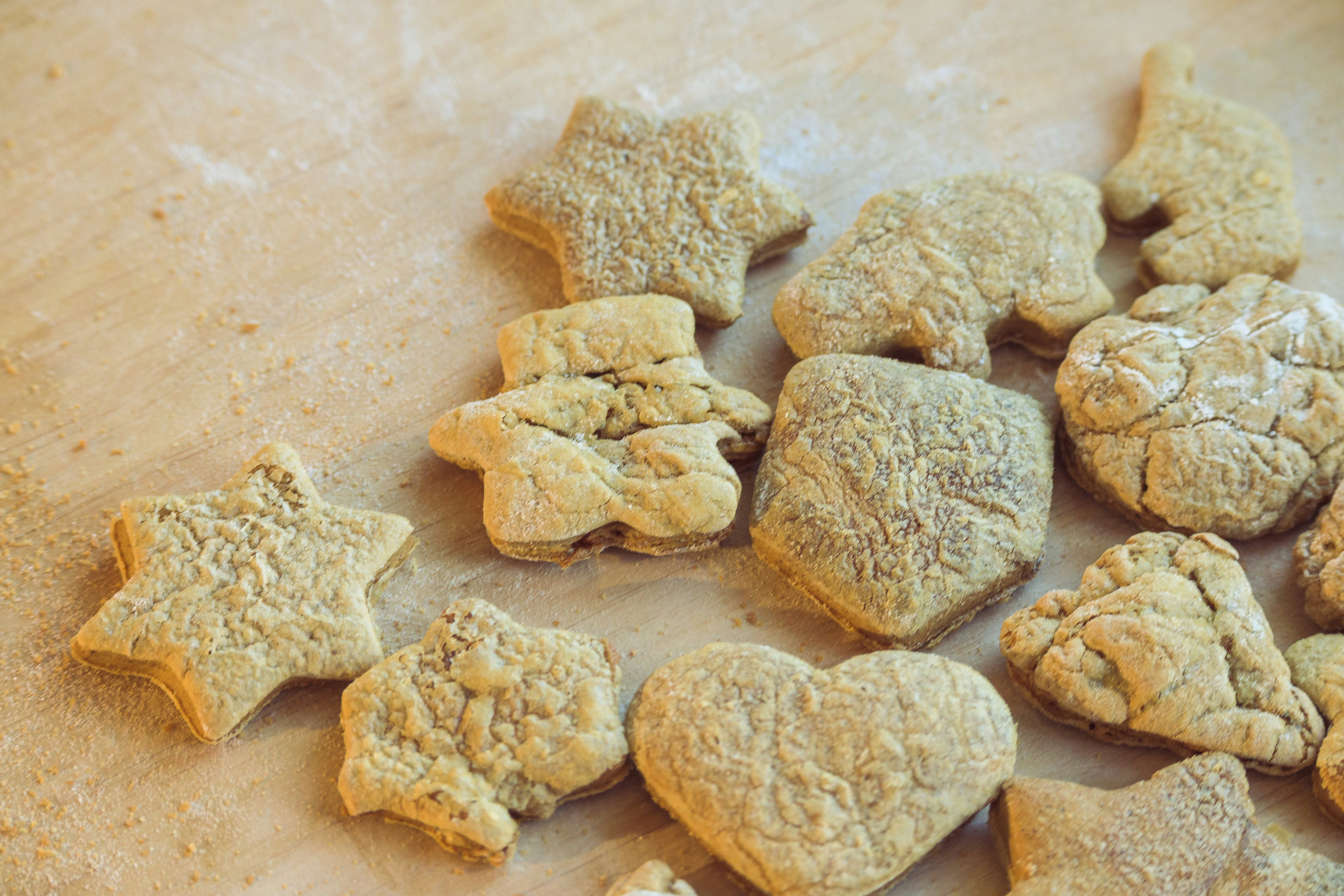 brown and white cookies on white surface