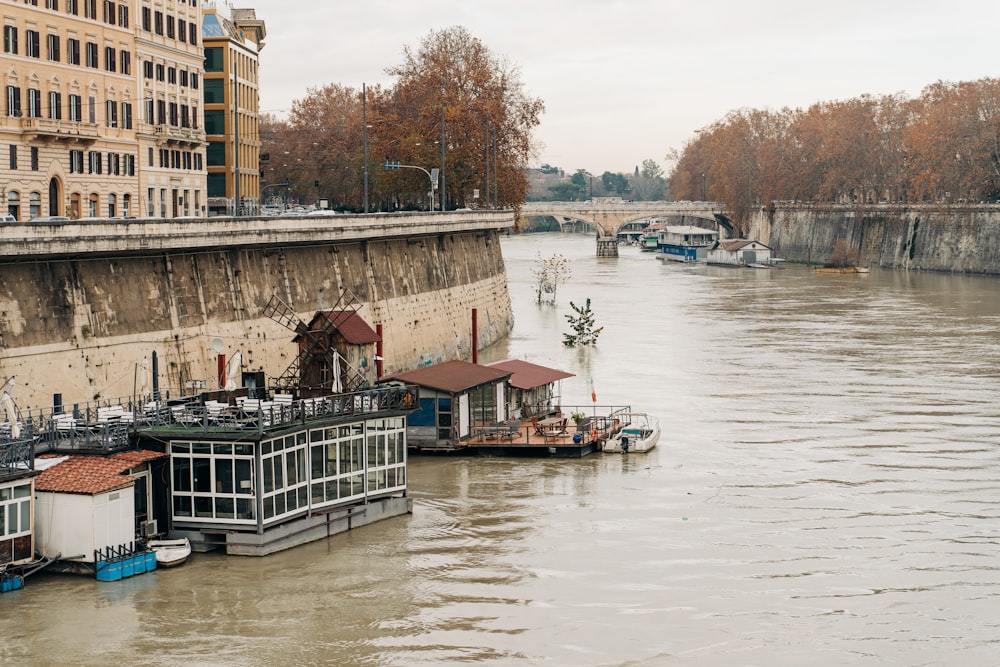 people riding on boat on river during daytime