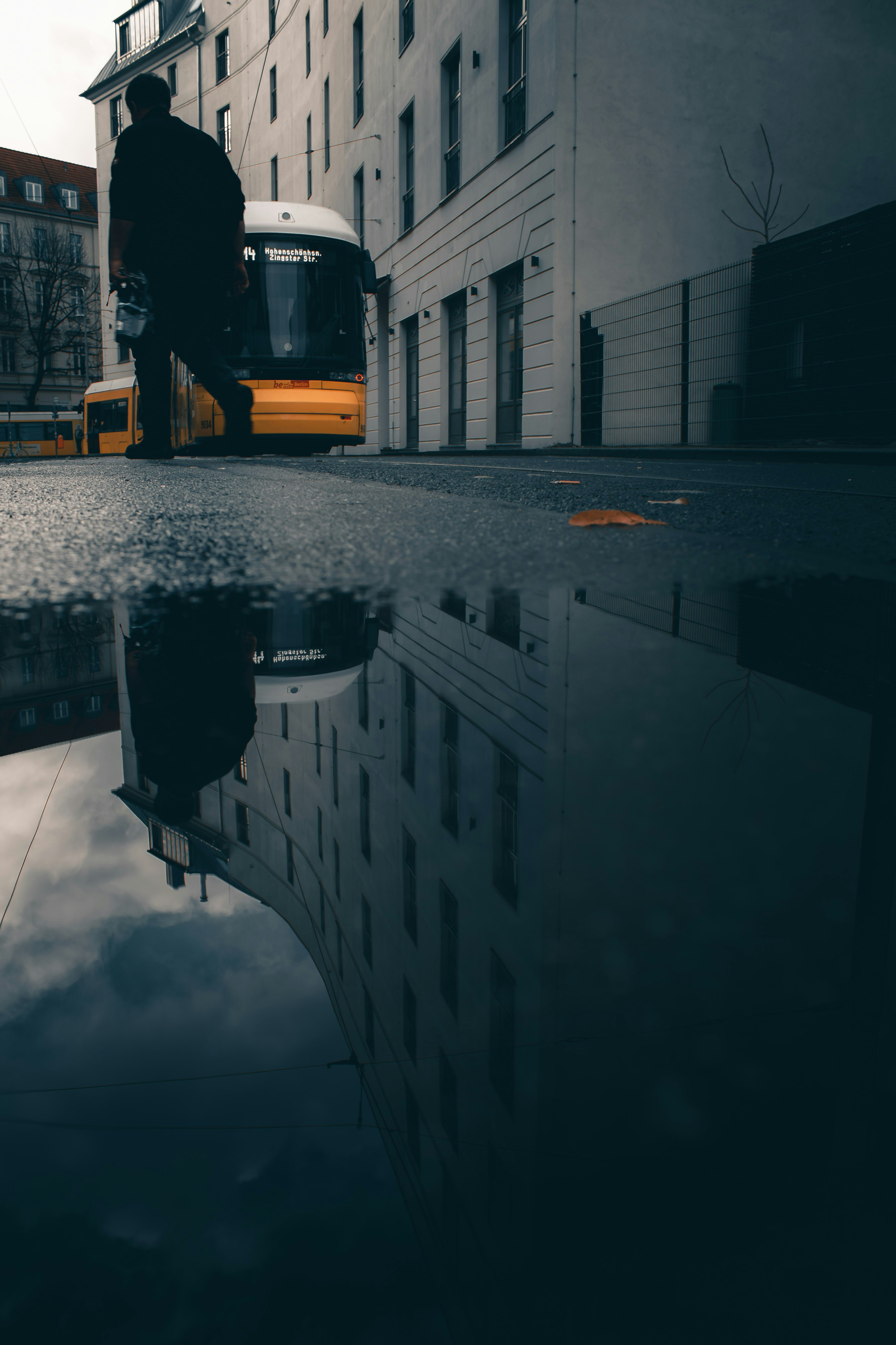 yellow bus on road during daytime