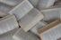 white and brown book on brown woven surface