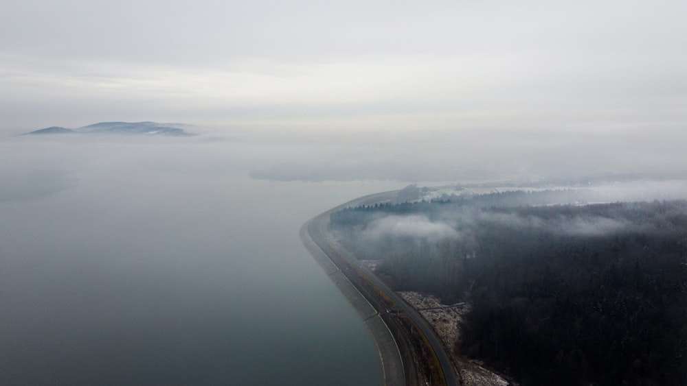 aerial view of road near body of water