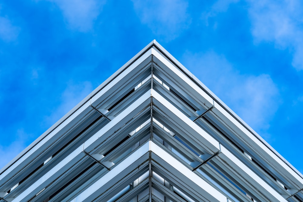white and black concrete building under blue sky during daytime