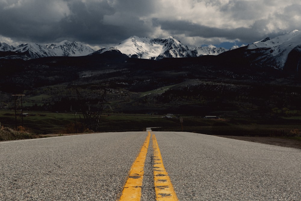 yellow line on gray asphalt road