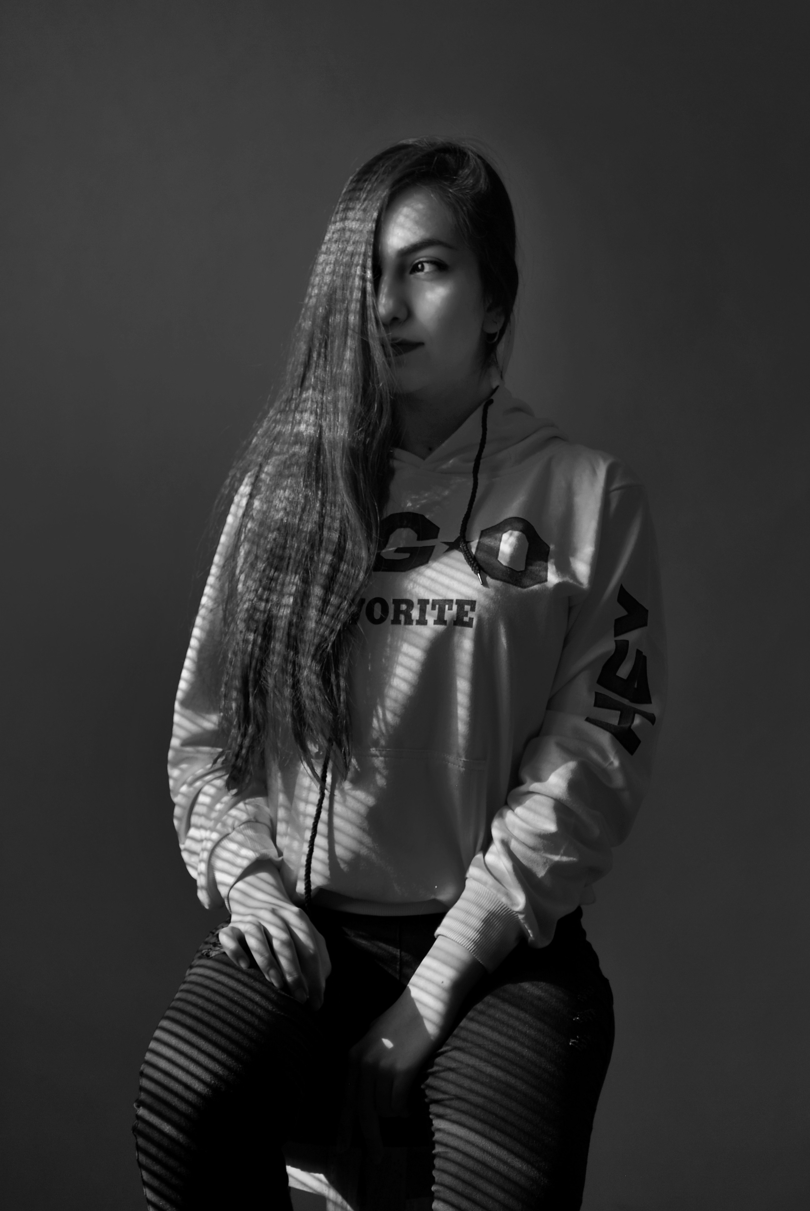 woman in black and white long sleeve shirt