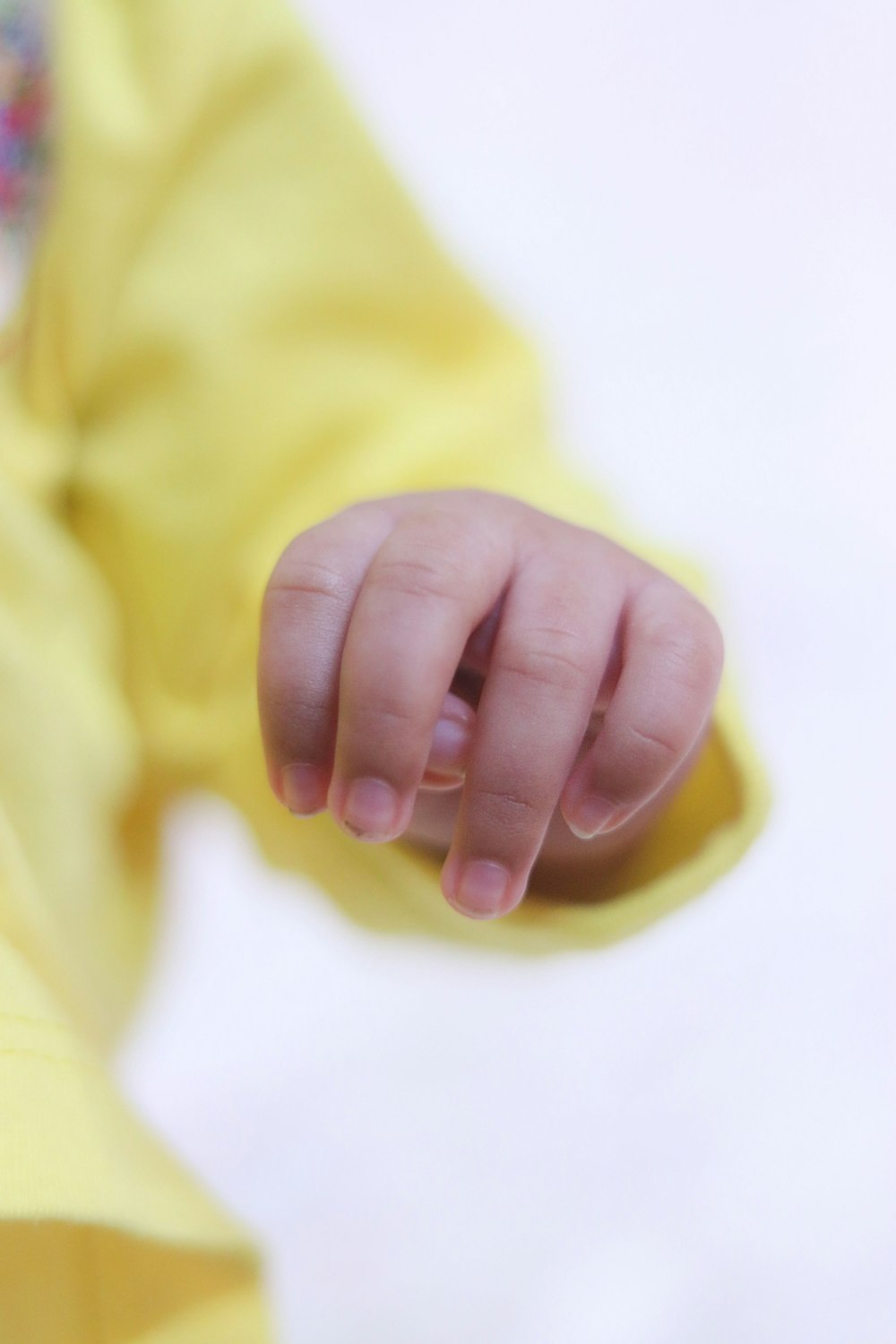 person in yellow long sleeve shirt