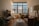 A cozy living room with modern furniture and soft natural lighting.