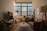A cozy living room with natural light and modern decor.