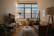 A cozy living room with neatly arranged furniture and clean surfaces.
