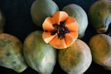 Ripe papayas arranged beautifully on a table.
