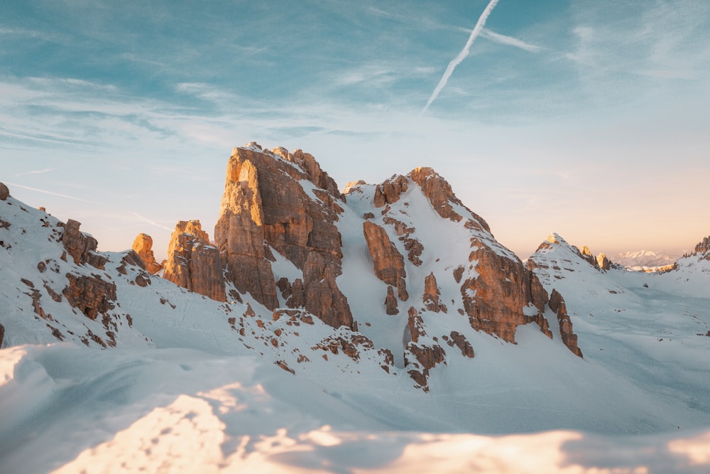 brown and white mountain under blue sky during daytime