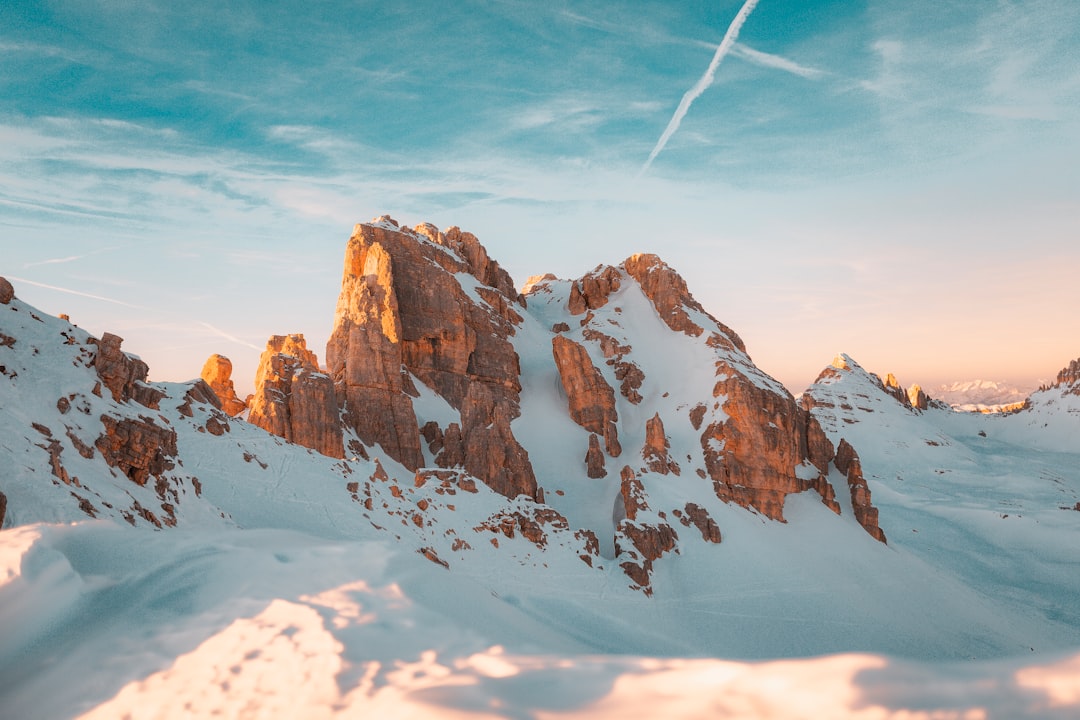 brown and white mountain under blue sky during daytime